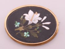 A pietra dura brooch. 4.5 cm long.