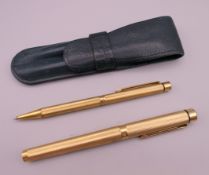 A Sheaffer fountain pen and a Sheaffer ballpoint pen, together with a leather Yard-O-Led pen case.