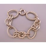 A heavy silver rope design bracelet. 21 cm long. 78.9 grammes.