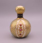 A Coalport porcelain scent bottle. 8 cm high.