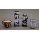 Three various Oriental vases and a cup. The largest 13 cm high.