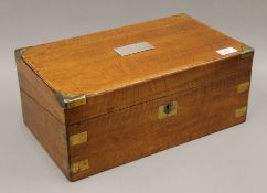 A Victorian brass bound wooden writing slope, the lid with presentation inscription. 40.5 cm wide.