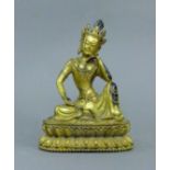 A gilt bronze model of Buddha. 19.5 cm high.