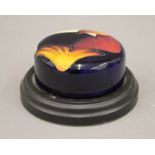 A Moorcroft paperweight. 11 cm diameter overall.