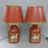 A pair of red toleware lamps. 70 cm high overall.