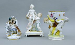 Three 19th century Continental porcelain figural groups. The largest 29 cm high.