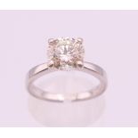 A platinum diamond solitaire ring, the stone approximately 1.9 carats. Ring size L.