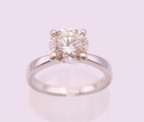 A platinum diamond solitaire ring, the stone approximately 1.9 carats. Ring size L.