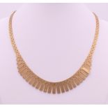 A 9 ct gold necklace. 42 cm long. 33.6 grammes.