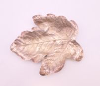 An unmarked silver leaf. 12 cm long. 35.3 grammes.