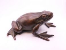 A bronze model of a frog. 4.5 cm long.