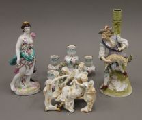 Three various porcelain figurines.