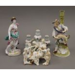 Three various porcelain figurines.