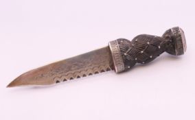 An unusual 19th century brooch in the form of a sgian dubh. 8.5 cm long.
