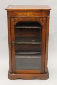 A Victorian inlaid walnut music cabinet. 54.5 cm wide.