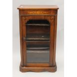 A Victorian inlaid walnut music cabinet. 54.5 cm wide.