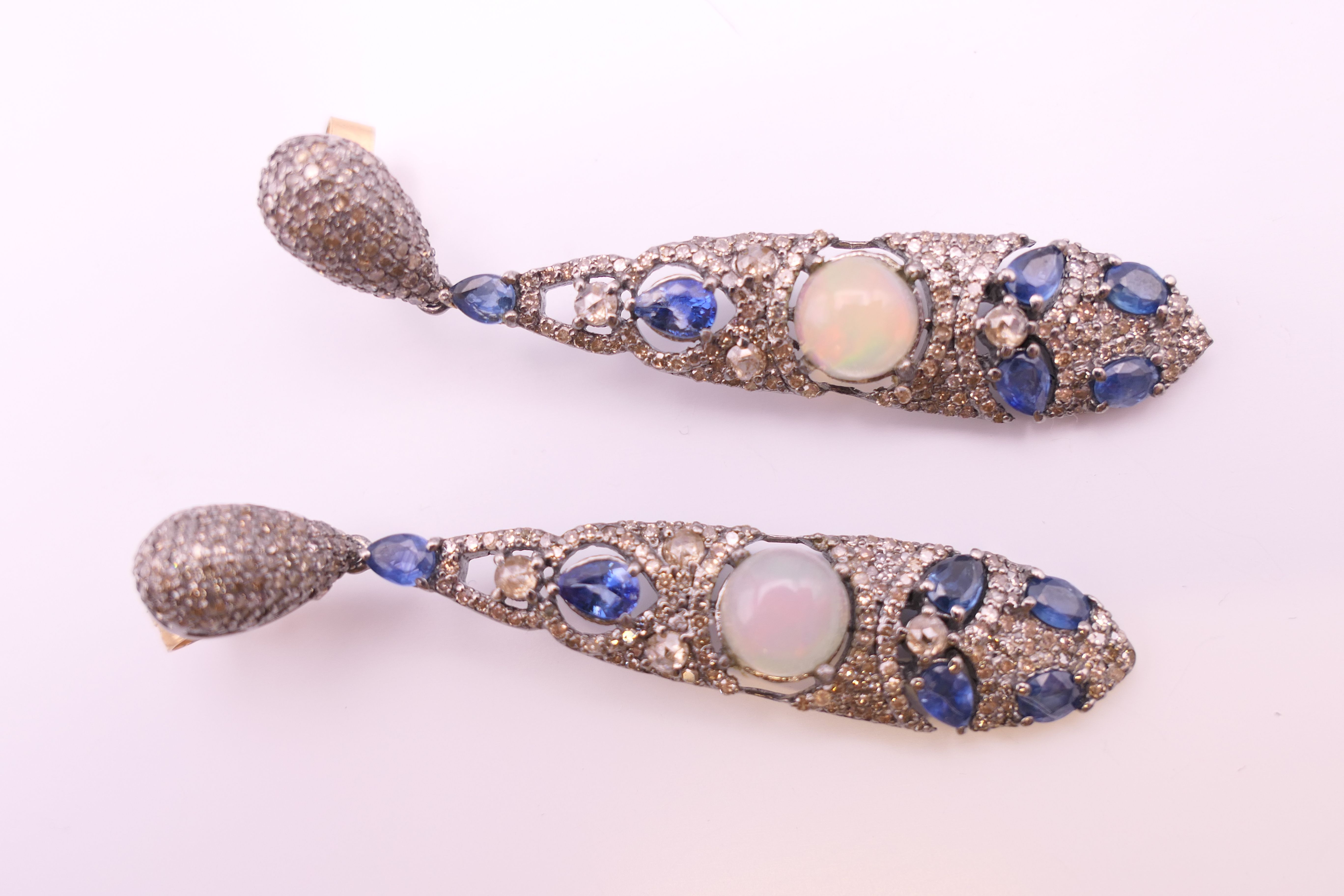 A pair of opal, diamond and sapphire earrings. 5.75 cm high. - Image 3 of 7