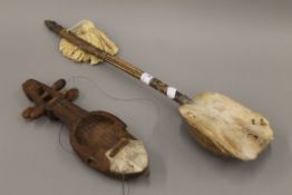 Two Eastern musical instruments. The largest 56 cm long.