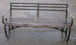 A 19th century iron strapwork bench. 153 cm wide x 80.5 cm high x 60 cm deep.