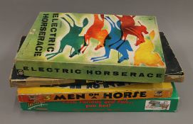 A quantity of vintage horse racing games.