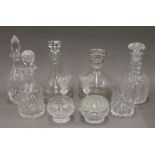 Four cut glass decanters and various cut glasswares.