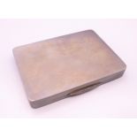 A silver cigarette case. 8 x 6 cm. 97.4 grammes.