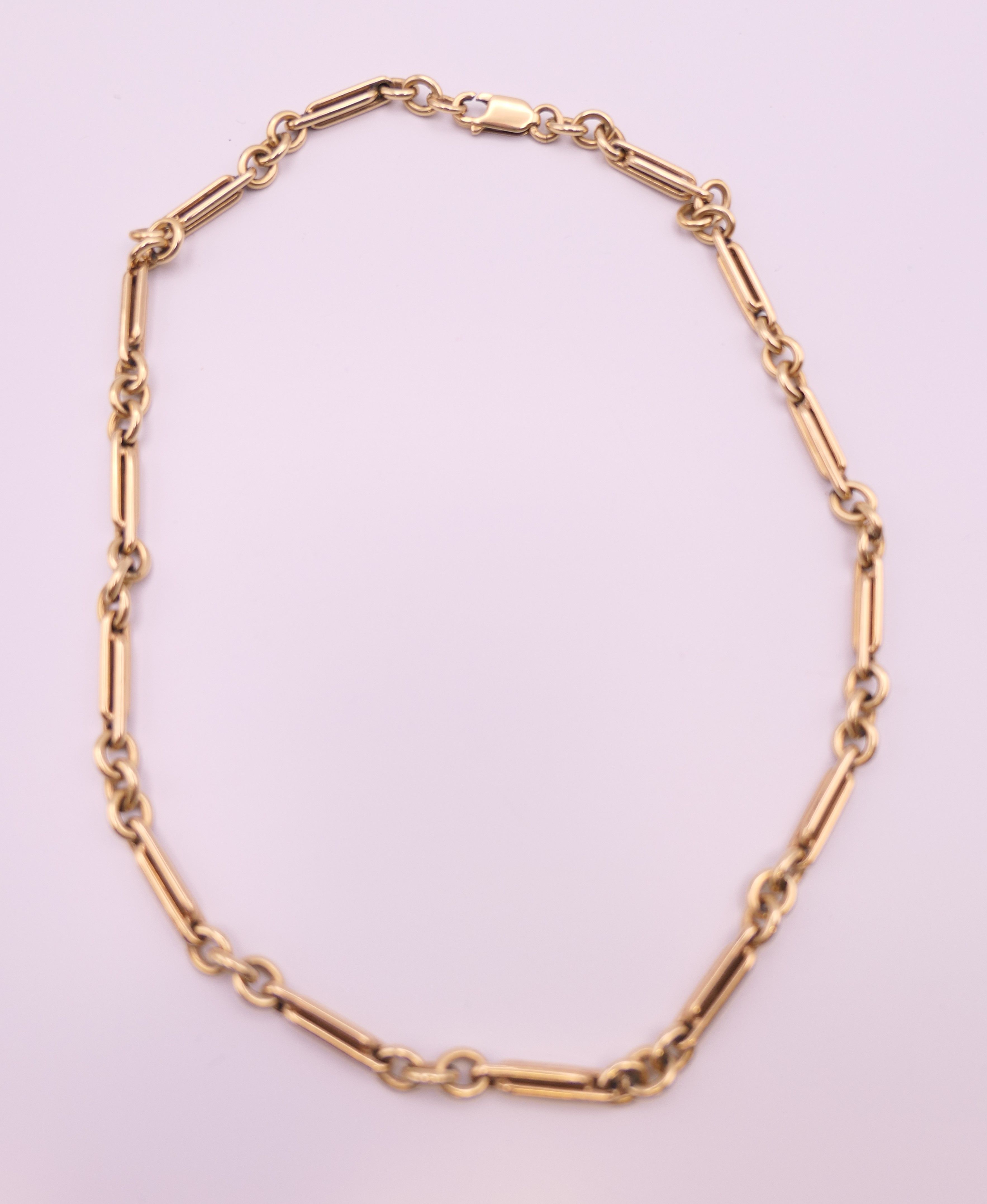 A 9 ct gold watch chain, converted to a necklace. 40.5 cm long. 29.9 grammes. - Image 2 of 5