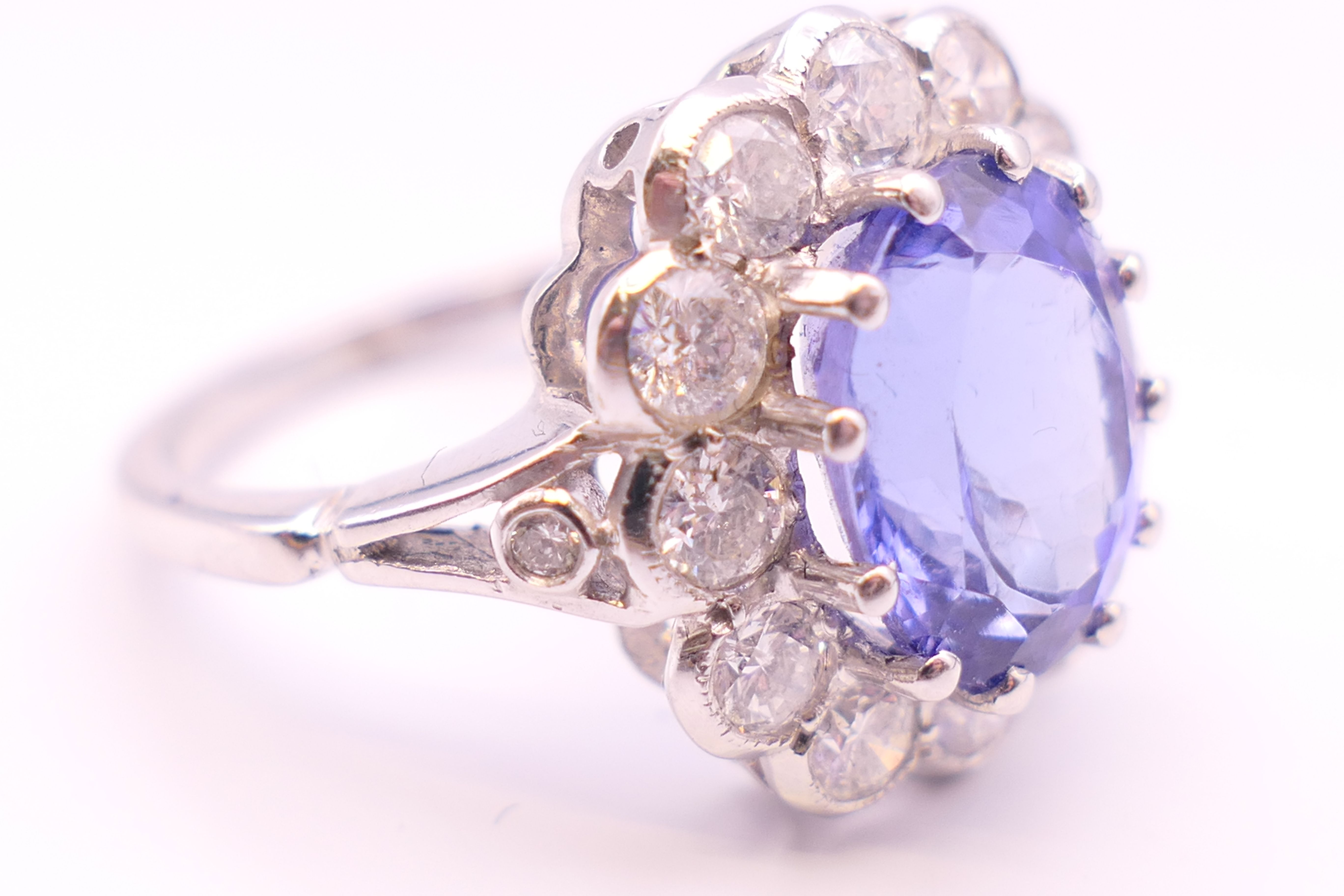 An 18 ct white gold ring with central tanzanite of 2. - Image 8 of 8