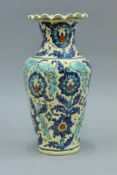 An Islamic/Persian pottery vase. 28 cm high.