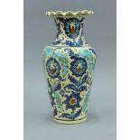 An Islamic/Persian pottery vase. 28 cm high.