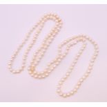 A string of pearls. 120 cm long.