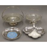 Four pieces of silver plate.
