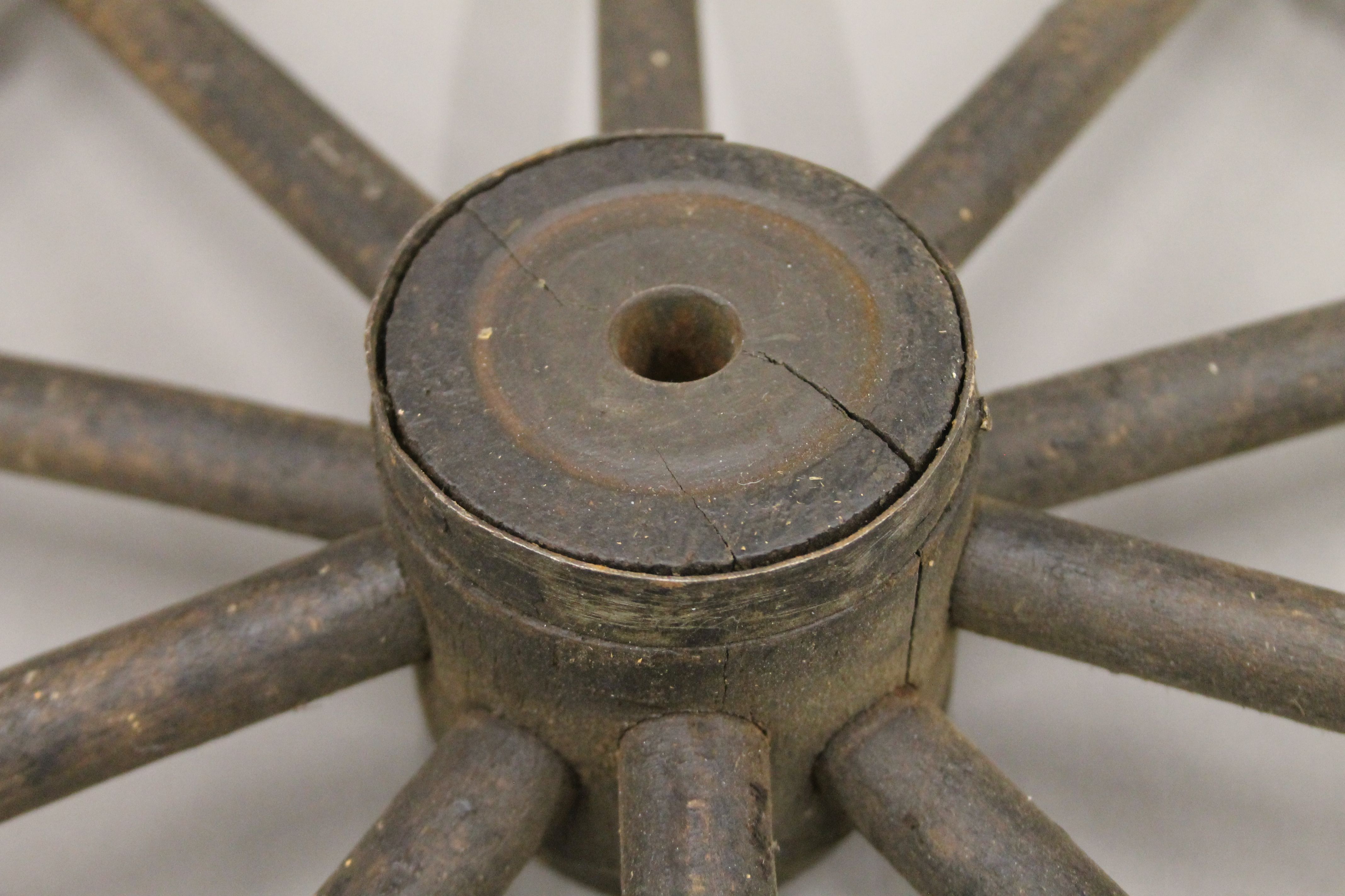 Two small antique iron mounted wooden wheels. 42 cm diameter. - Image 4 of 4
