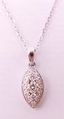 An 18 ct white gold diamond pendant necklace.
