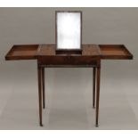 A 19th century mahogany gentleman's fold over dressing table. 63 cm wide.