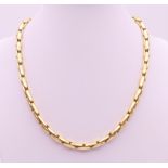 An 18 ct gold necklace. 42 cm long. 33.1 grammes.