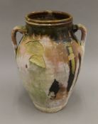 A part drip glazed terracotta pot. 41 cm high.