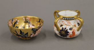 Two small Coalport vessels, each decorated in the Imari palette. The largest 4 cm high.