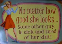 A tin sign inscribed 'No Matter How Good She Looks, Some Other Guy is Sick and Tired of Her Shit!'.