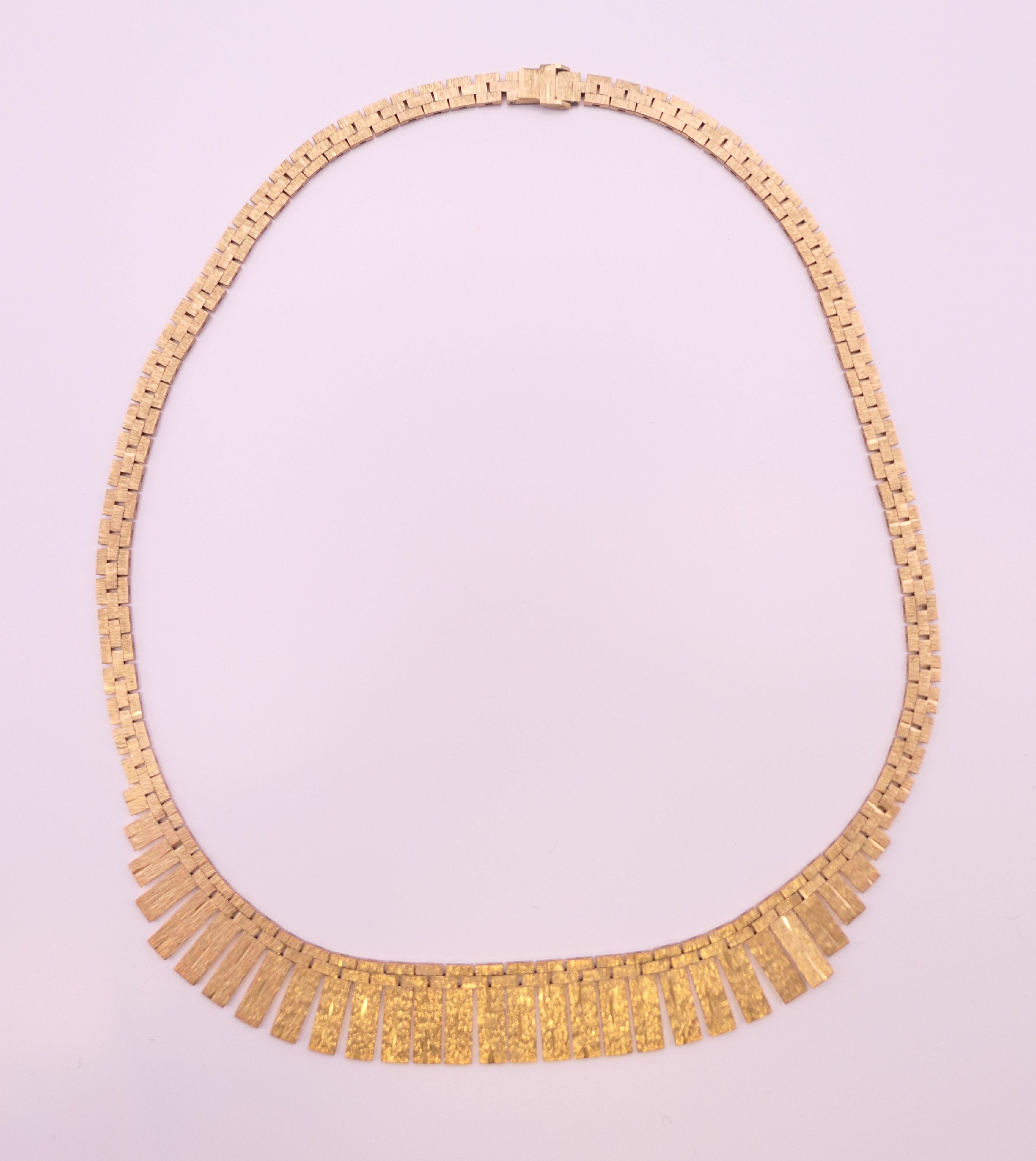 A 9 ct gold necklace. 42 cm long. 33.6 grammes. - Image 2 of 8