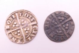 An Edward I silver penny and a half penny.
