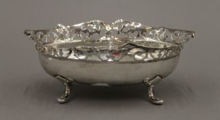 A pierced silver bon bon dish. 18 cm long. 191.3 grammes.