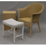 A Lloyd Loom chair, a Lloyd Loom linen basket and a stool. The former 64 cm wide.