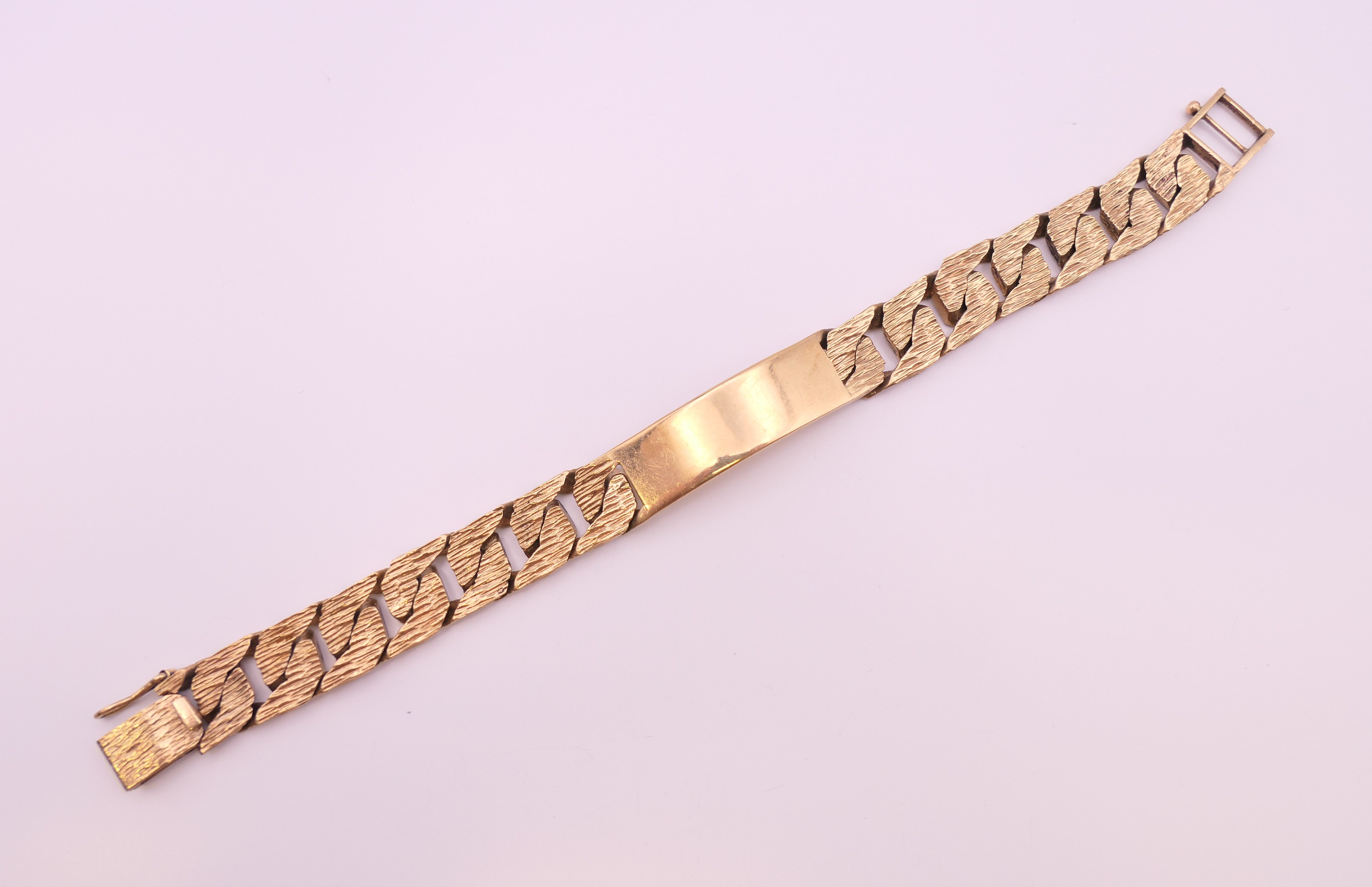 A 9 ct gold identity bracelet. 20 cm long. 60 grammes. - Image 2 of 8