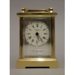 A Taylor & Bligh silver mounted carriage clock. 15 cm high.