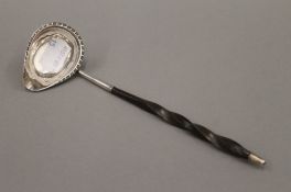 A Georgian beleen handled toddy ladle, hallmarked London 1825. 18.5 cm long.