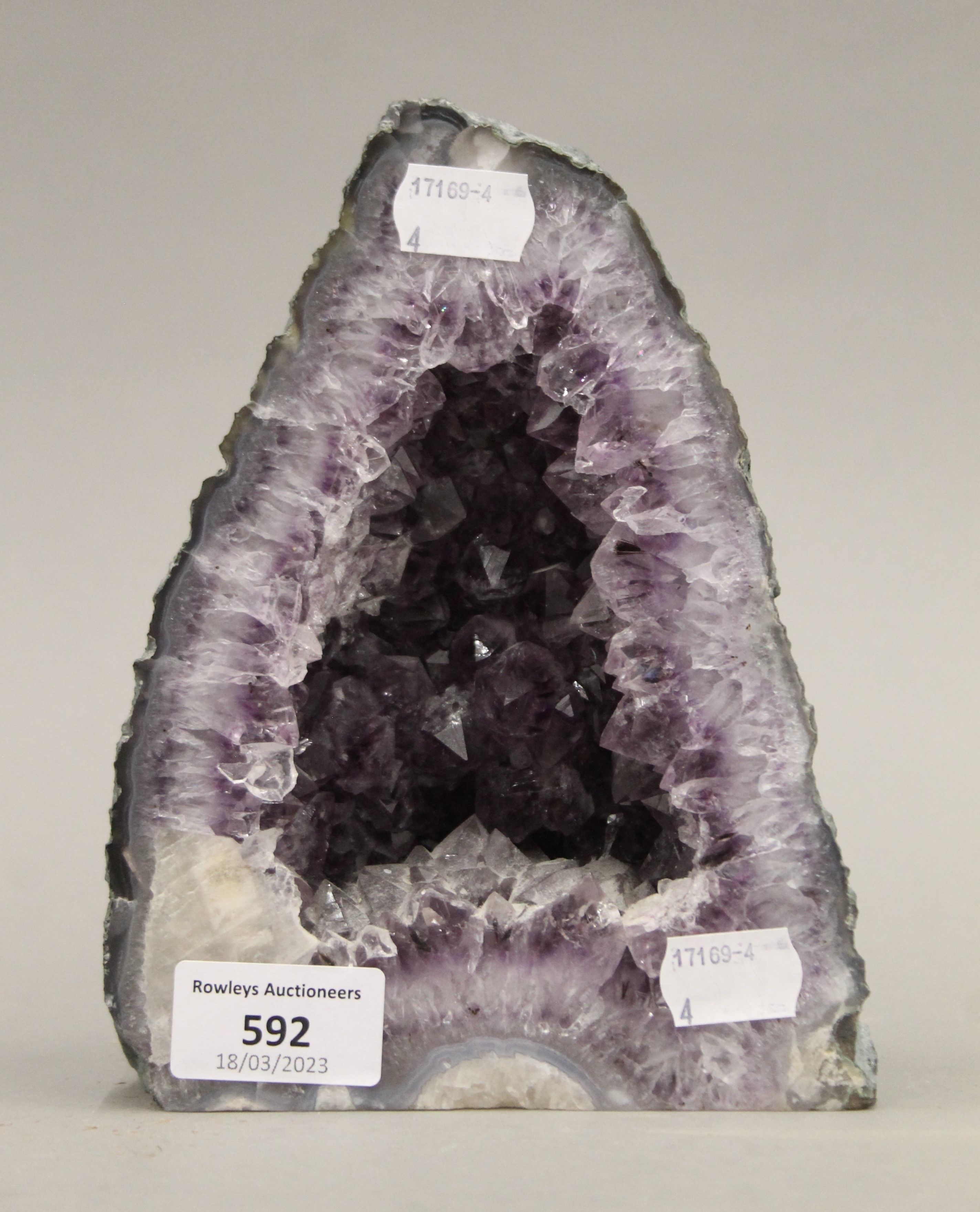 An amethyst geode. 18.5 cm high.