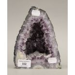 An amethyst geode. 18.5 cm high.