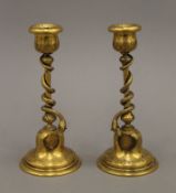 A pair of 19th century gilt bronze candlesticks. 17 cm high.