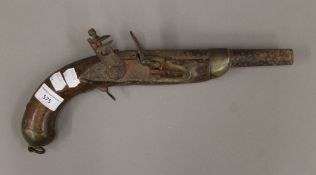 An antique flintlock pistol. 36 cm long.